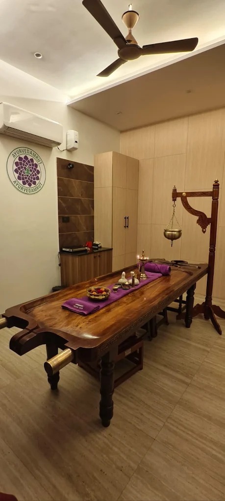 Traditional Ayurvedic therapy room prepared for Panchakarma treatment